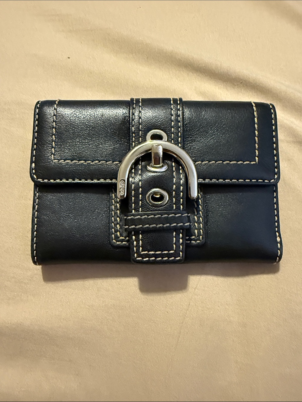 Coach Black Leather Wallet with Silver Buckle and Cream Stitching